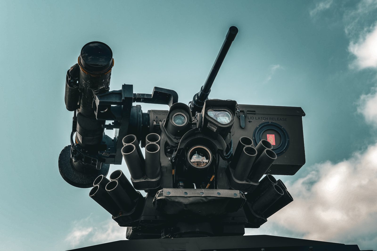 Remote weapon station against the sky