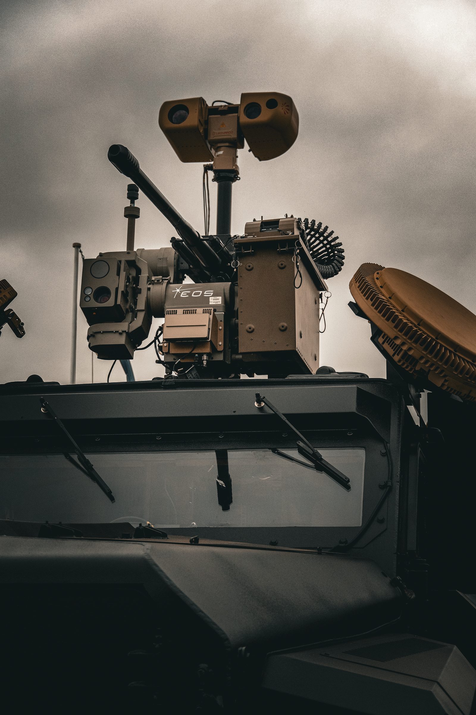 Remote weapon station and sensor suite on an armoured vehicle