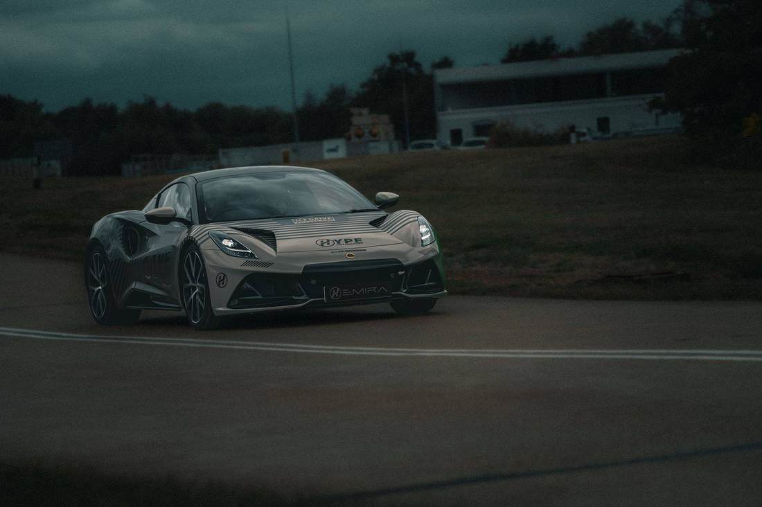 Sports car at speed on a test track