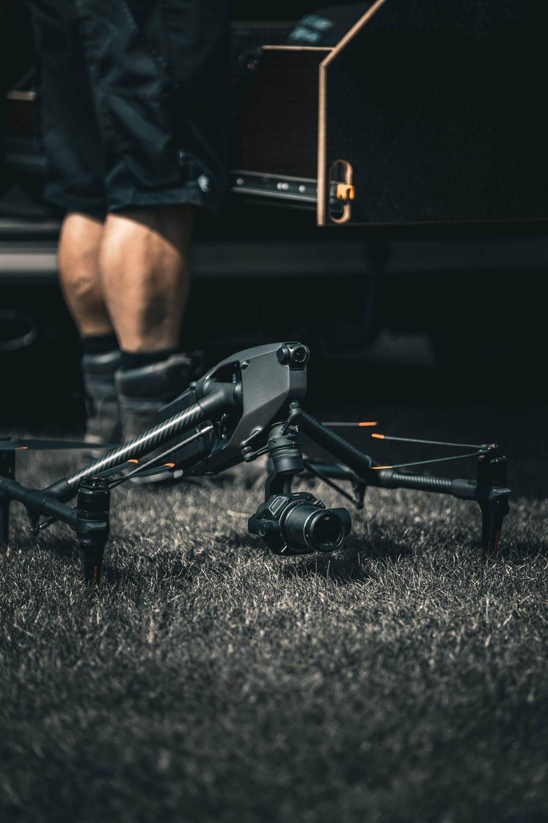 DJI Inspire 3 staged on the grass beside the kit van